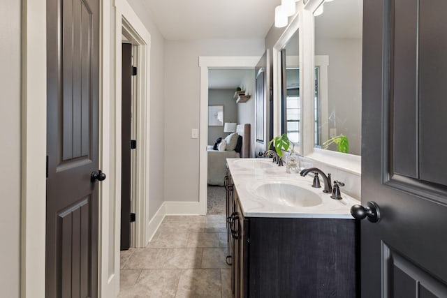 9201 Dutch Belted Ct, Nolensville, TN 37135 - bathroom featuring double vanity, baseboards, and tile patterned floors