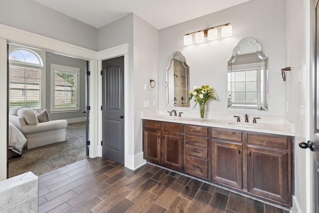 9201 Dutch Belted Ct, Nolensville, TN 37135 - ensuite bathroom featuring double vanity, wood finished floors, and baseboards