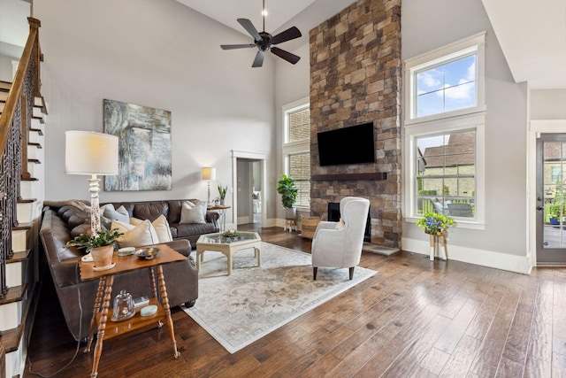 9201 Dutch Belted Ct, Nolensville, TN 37135 - living area featuring high vaulted ceiling, ceiling fan, wood-type flooring, baseboards, and plenty of natural light