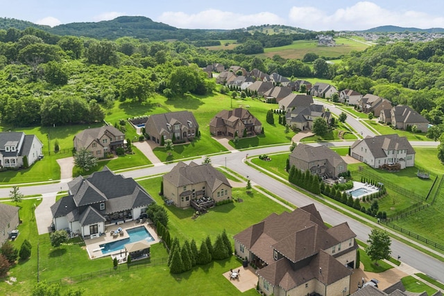 9201 Dutch Belted Ct, Nolensville, TN 37135 - aerial perspective of suburban area featuring a pool and mountains