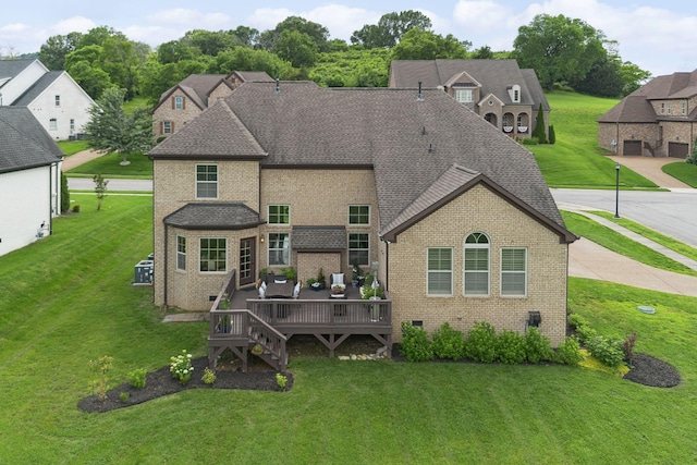 9201 Dutch Belted Ct, Nolensville, TN 37135 - back of house featuring brick siding, a deck, and a lawn