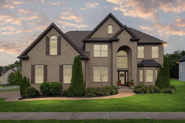 9201 Dutch Belted Ct, Nolensville, TN 37135 - french provincial home featuring brick siding and a front lawn