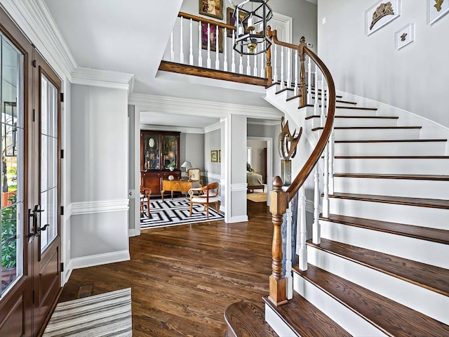 1004 Jones Pkwy, Brentwood, TN 37027 - foyer with wood finished floors, stairway, baseboards, french doors, and crown molding