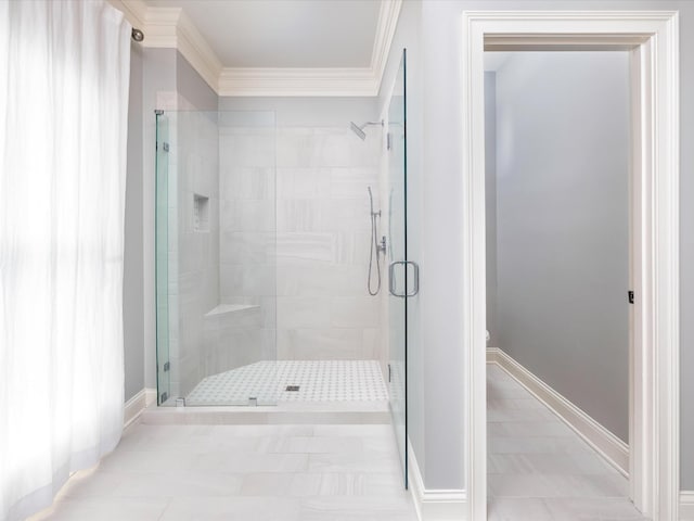 1004 Jones Pkwy, Brentwood, TN 37027 - bathroom featuring a shower stall, crown molding, toilet, and baseboards
