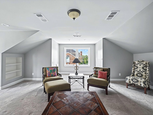 1004 Jones Pkwy, Brentwood, TN 37027 - sitting room featuring carpet flooring, baseboards, lofted ceiling, and built in features