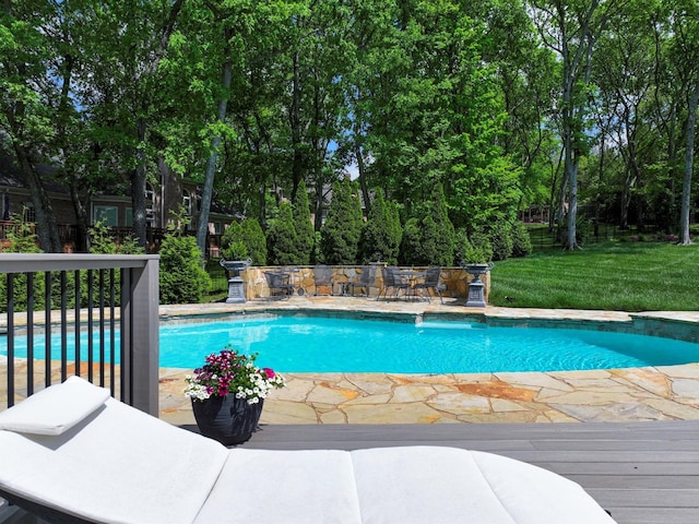 1004 Jones Pkwy, Brentwood, TN 37027 - swimming pool with a lawn and view of wooded area