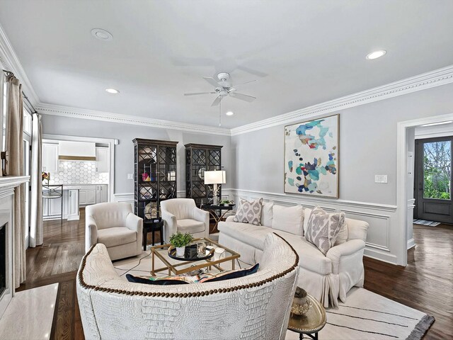 1004 Jones Pkwy, Brentwood, TN 37027 - living area with ceiling fan, crown molding, recessed lighting, a wainscoted wall, and wood finished floors