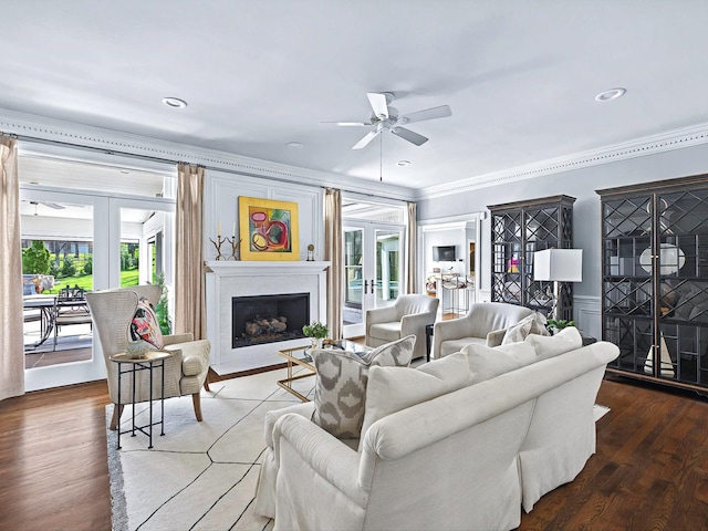 1004 Jones Pkwy, Brentwood, TN 37027 - living room with a ceiling fan, healthy amount of natural light, a fireplace, ornamental molding, and wood finished floors