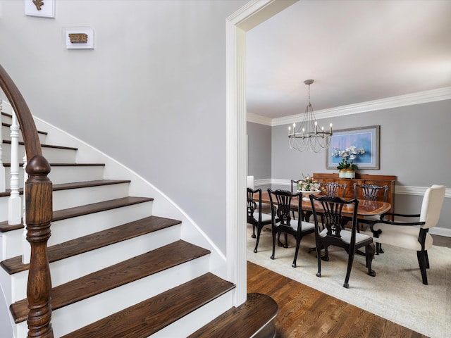 1004 Jones Pkwy, Brentwood, TN 37027 - stairs featuring wood finished floors, ornamental molding, a chandelier, and baseboards