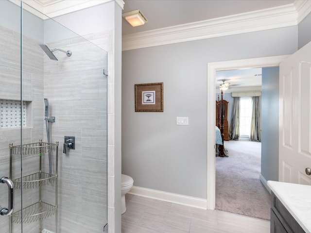 1004 Jones Pkwy, Brentwood, TN 37027 - ensuite bathroom featuring crown molding, a shower stall, vanity, toilet, and baseboards