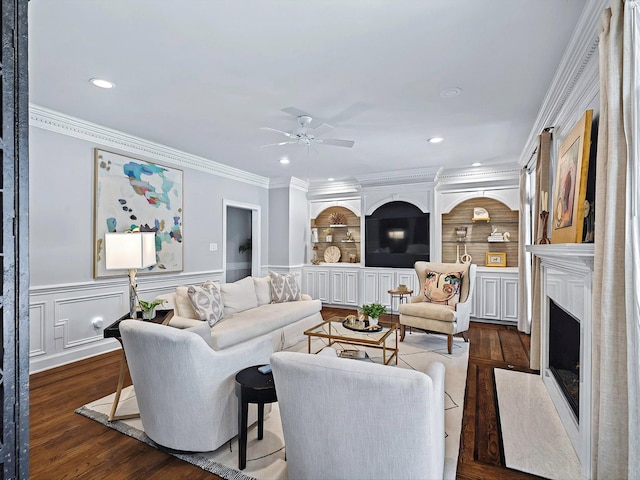 1004 Jones Pkwy, Brentwood, TN 37027 - living area with ornamental molding, ceiling fan, dark wood-style flooring, a fireplace, and recessed lighting