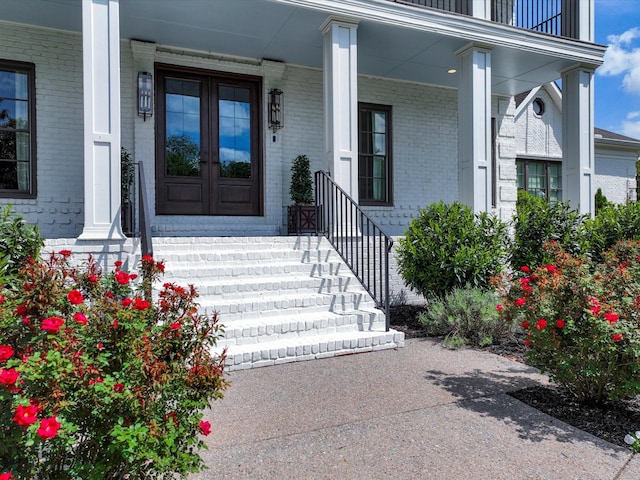 1004 Jones Pkwy, Brentwood, TN 37027 - property entrance with a porch and brick siding