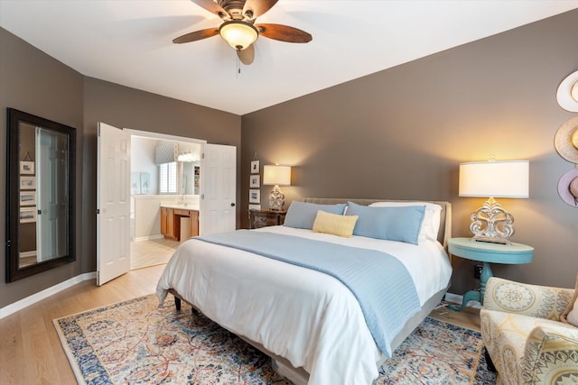736 Arbor Springs Dr, Mount Juliet, TN 37122 - bedroom featuring light wood-style floors, connected bathroom, a ceiling fan, and baseboards