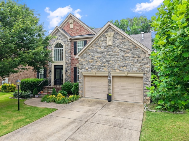 736 Arbor Springs Dr, Mount Juliet, TN 37122 - traditional-style house with a front yard, concrete driveway, stone siding, and an attached garage