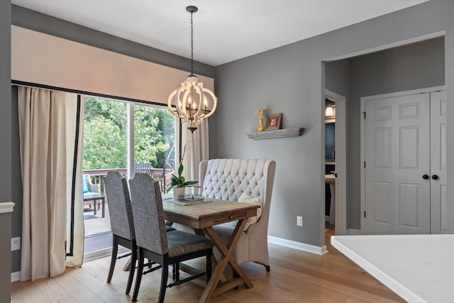 736 Arbor Springs Dr, Mount Juliet, TN 37122 - dining area featuring light wood-type flooring, a chandelier, and baseboards