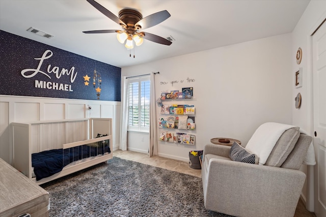 736 Arbor Springs Dr, Mount Juliet, TN 37122 - carpeted bedroom with a wainscoted wall and a ceiling fan
