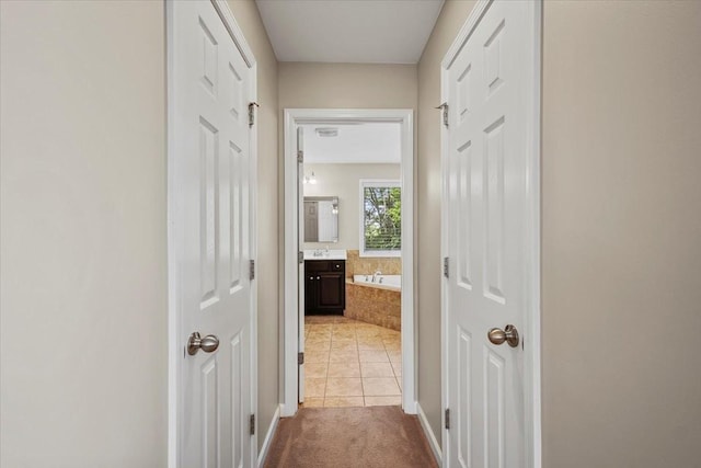 2740 Alvin Sperry Pass, Mount Juliet, TN 37122 - corridor with tile patterned floors, carpet flooring, and baseboards