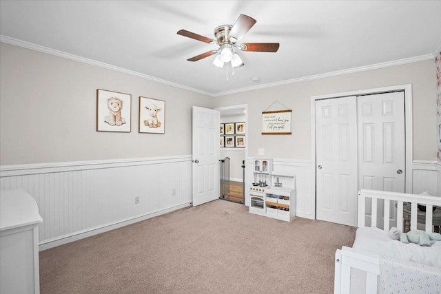2740 Alvin Sperry Pass, Mount Juliet, TN 37122 - bedroom with carpet floors, crown molding, a wainscoted wall, a closet, and ceiling fan