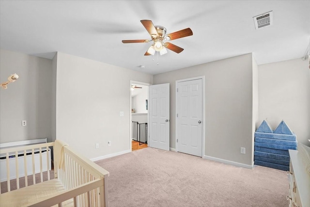 2740 Alvin Sperry Pass, Mount Juliet, TN 37122 - carpeted bedroom featuring baseboards, ceiling fan, and a crib