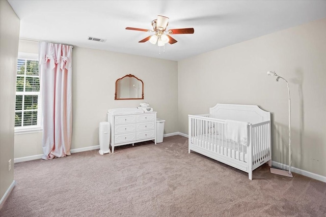 2740 Alvin Sperry Pass, Mount Juliet, TN 37122 - carpeted bedroom with a nursery area, baseboards, and a ceiling fan