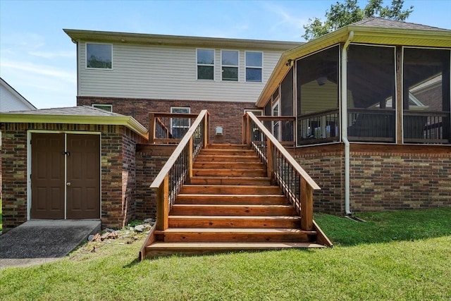 2740 Alvin Sperry Pass, Mount Juliet, TN 37122 - back of property featuring brick siding, stairway, a sunroom, and a yard