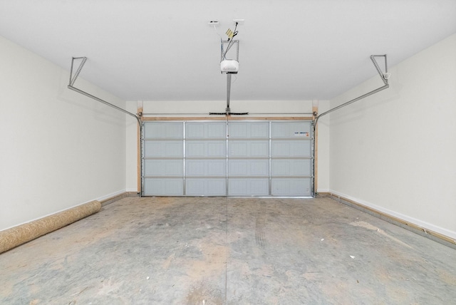 610 Liberty Park, Clarksville, TN 37042 - garage with baseboards and a garage door opener