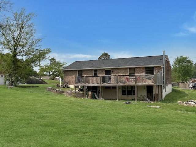 3113 Stafford Dr, Nashville, TN 37214 - back of property featuring a deck, a lawn, and brick siding