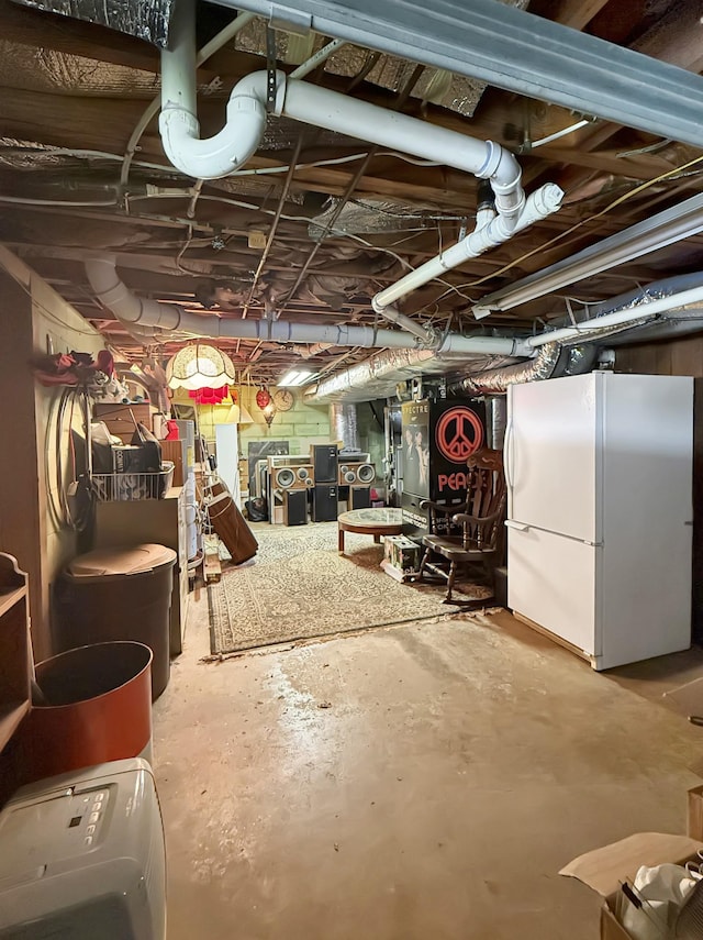 3113 Stafford Dr, Nashville, TN 37214 - unfinished basement featuring freestanding refrigerator and washer / dryer