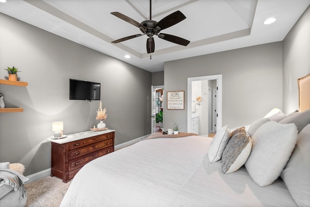 982 Red Bluff Way, Adams, TN 37010 - bedroom with recessed lighting, a tray ceiling, light carpet, baseboards, and ensuite bath