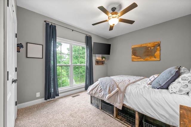 982 Red Bluff Way, Adams, TN 37010 - bedroom with baseboards, carpet floors, and a ceiling fan