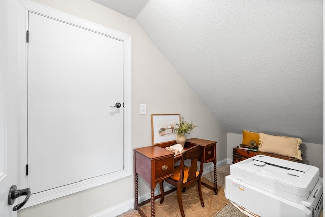 982 Red Bluff Way, Adams, TN 37010 - home office featuring vaulted ceiling, baseboards, and a textured ceiling