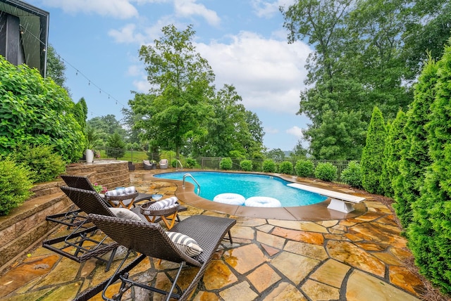 982 Red Bluff Way, Adams, TN 37010 - view of swimming pool featuring a fenced backyard, a patio area, and a diving board