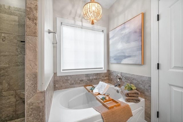 982 Red Bluff Way, Adams, TN 37010 - full bathroom with a bath and a chandelier