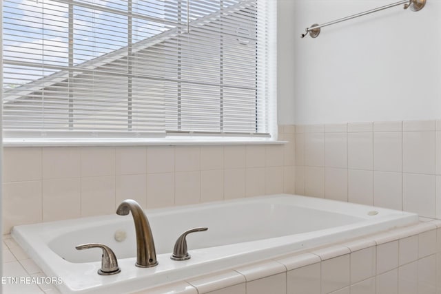 241 Hillside Ln, Lenoir City, TN 37771 - full bathroom featuring a garden tub and plenty of natural light