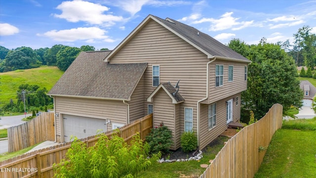 241 Hillside Ln, Lenoir City, TN 37771 - view of side of home with a shingled roof
