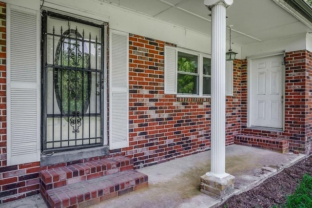 852 Eastland Rd, Sparta, TN 38583 - entrance to property featuring a porch and brick siding