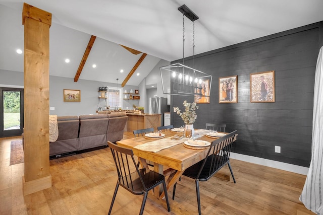 1270 Post Oak Rd, Belvidere, TN 37306 - dining area featuring light wood-style floors, an accent wall, a chandelier, recessed lighting, and baseboards
