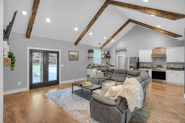 1270 Post Oak Rd, Belvidere, TN 37306 - living room with beam ceiling, high vaulted ceiling, french doors, baseboards, and light wood finished floors