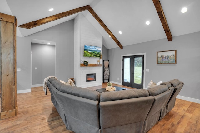 1270 Post Oak Rd, Belvidere, TN 37306 - living area with beam ceiling, baseboards, a fireplace, light wood-type flooring, and recessed lighting