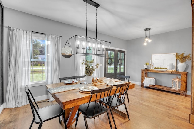 1270 Post Oak Rd, Belvidere, TN 37306 - dining space with light wood-style floors, french doors, and baseboards
