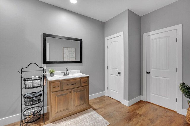 1270 Post Oak Rd, Belvidere, TN 37306 - bathroom with vanity, wood finished floors, and baseboards