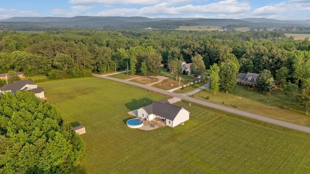 1270 Post Oak Rd, Belvidere, TN 37306 - aerial view of property's location featuring a mountain backdrop, rural landscape, and a forest