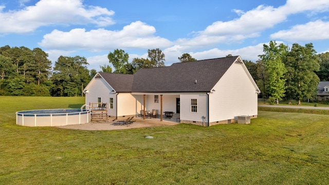 1270 Post Oak Rd, Belvidere, TN 37306 - rear view of house with crawl space, a yard, a patio area, and an outdoor pool