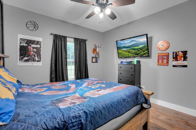 1270 Post Oak Rd, Belvidere, TN 37306 - bedroom with wood finished floors, baseboards, and a ceiling fan