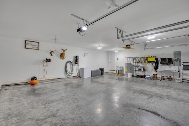 1270 Post Oak Rd, Belvidere, TN 37306 - garage featuring a garage door opener and water heater