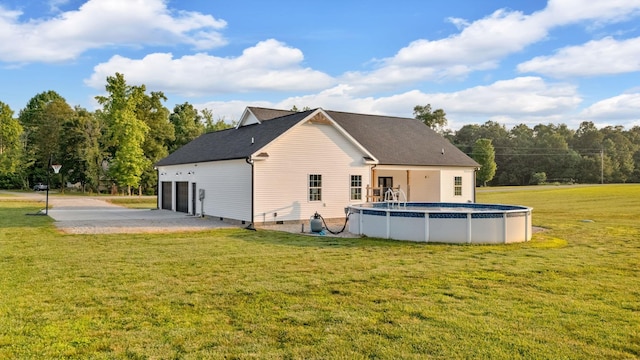 1270 Post Oak Rd, Belvidere, TN 37306 - back of house featuring a garage, a yard, crawl space, and an outdoor pool