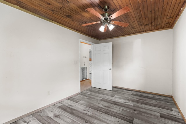 210 Welch Rd, Tazewell, TN 37879 - unfurnished room featuring ceiling fan, wooden ceiling, wood finished floors, and baseboards