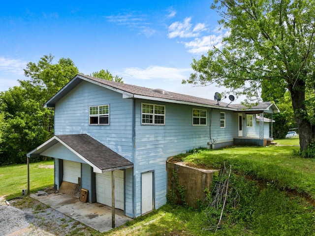 210 Welch Rd, Tazewell, TN 37879 - view of side of home with a garage, a yard, and roof with shingles
