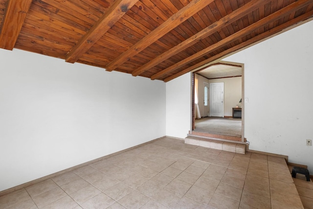 210 Welch Rd, Tazewell, TN 37879 - spare room with wood ceiling, light tile patterned floors, and baseboards