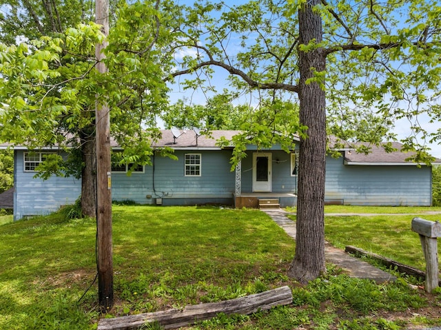 210 Welch Rd, Tazewell, TN 37879 - back of property with a lawn